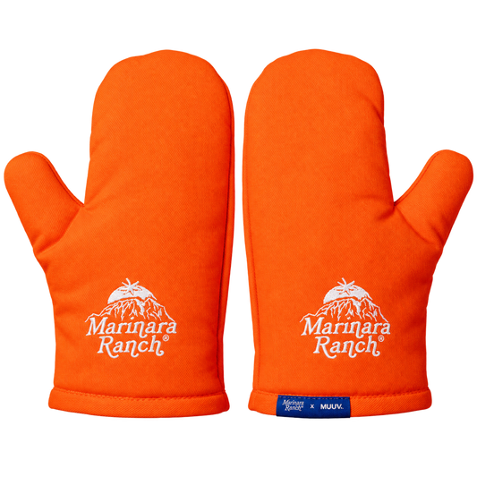 Pair of orange MUUV oven gloves, product shot