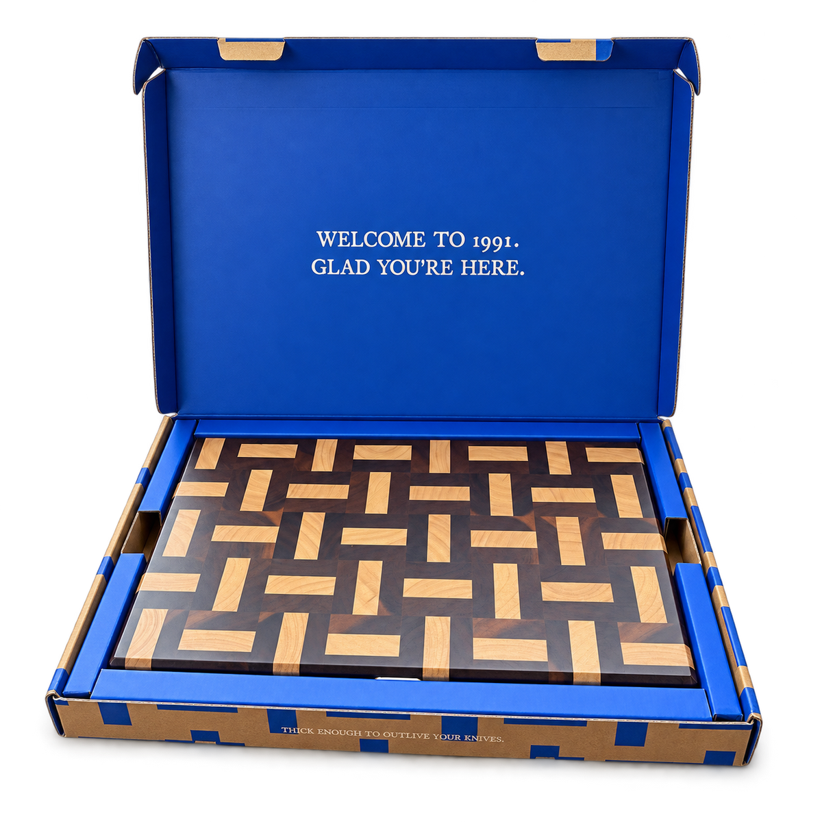 Open ONE BOARD box with the Inlay board and a welcome message inside the lid.