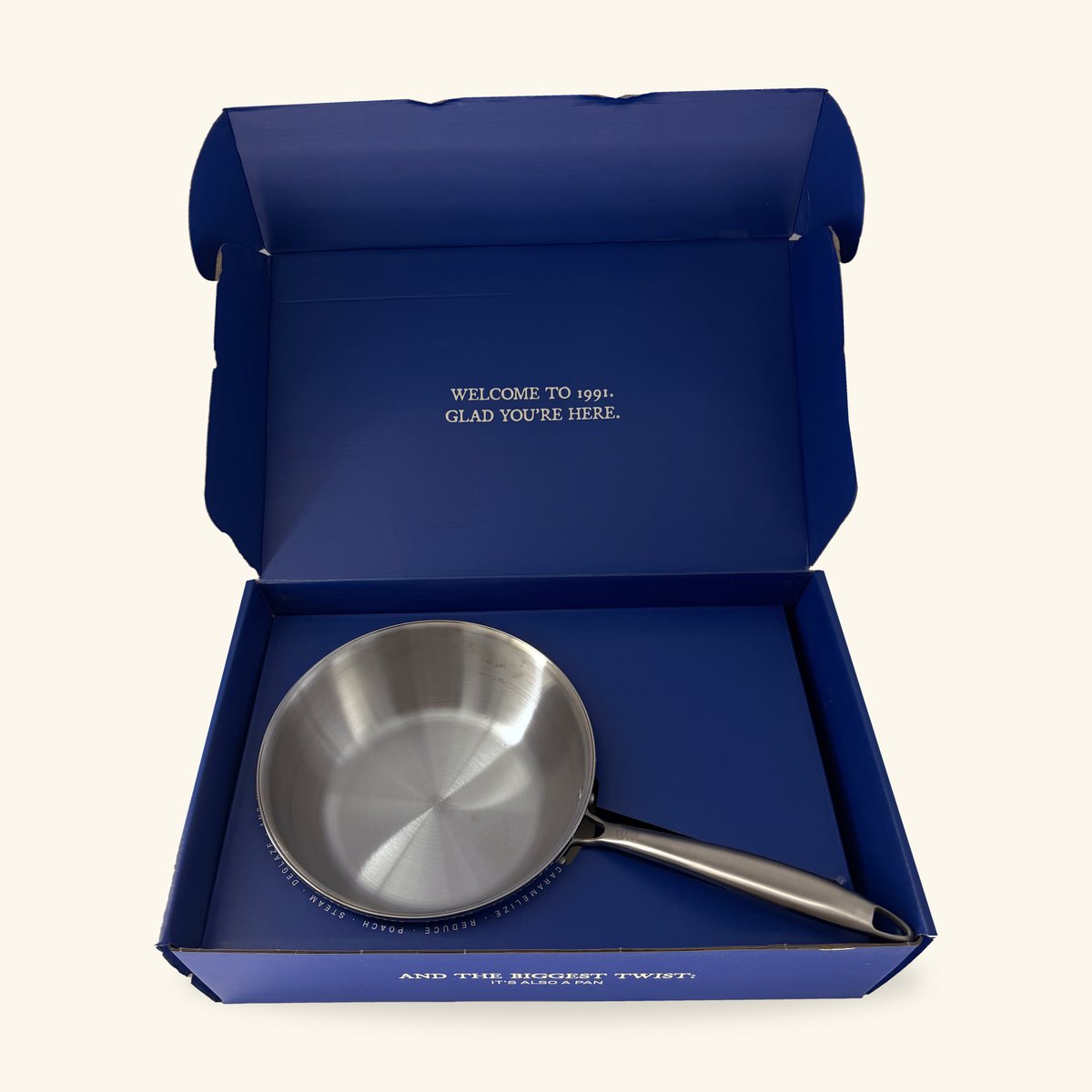 ONE POT in its open cobalt blue 1991 box with a fitted insert.